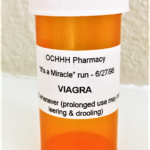 Hash novelty empty prescription pill vial labeled OCHHH Pharmacy "VIAGRA"